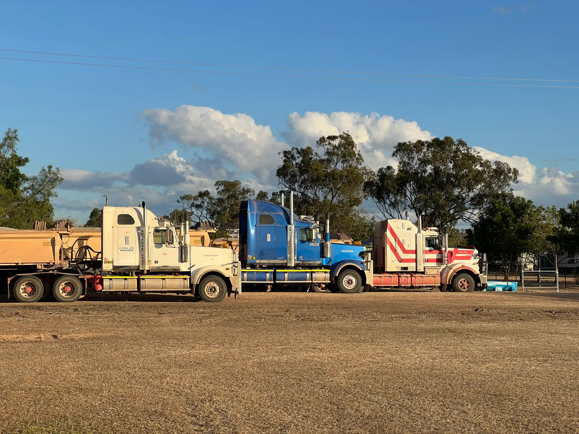 Three Conlan Contracting prime movers parked side by side